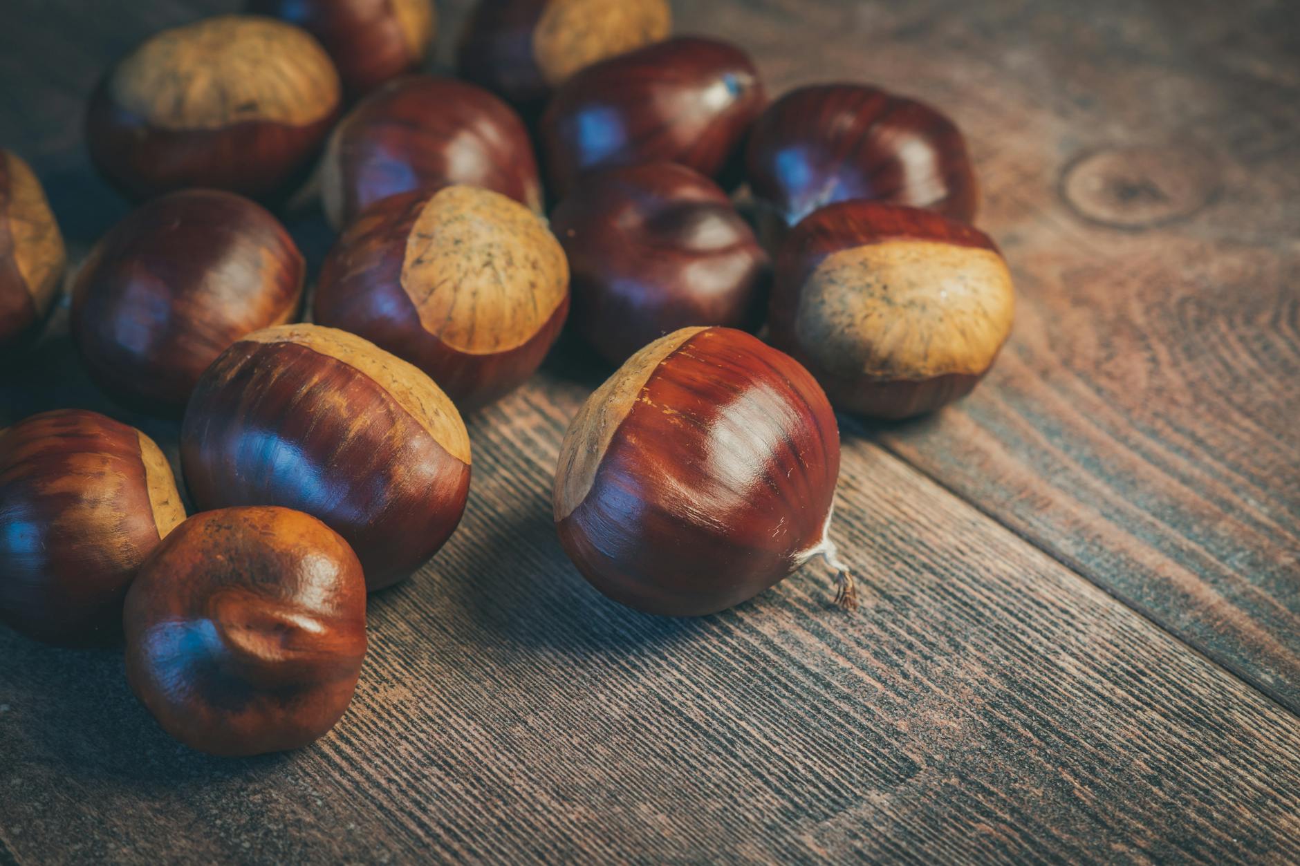 chestnuts on wooden table top